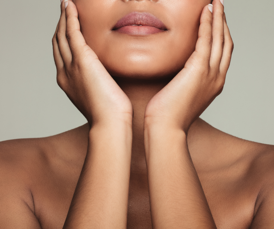 Model lower face with hands placed on both cheeks