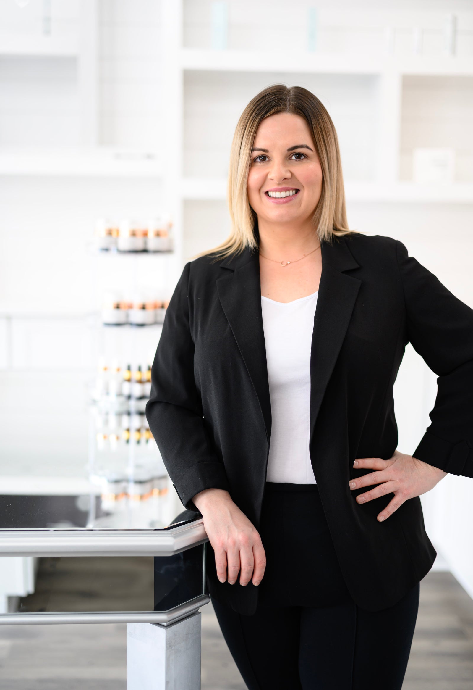 Claudia Flynn standing in front of Ogham acne safe skincare line